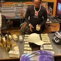 EST Gee, popular Louisville rapper, was signed by Yo Gotti to his CMG label, and Gotti presents him with $750,000 in cash