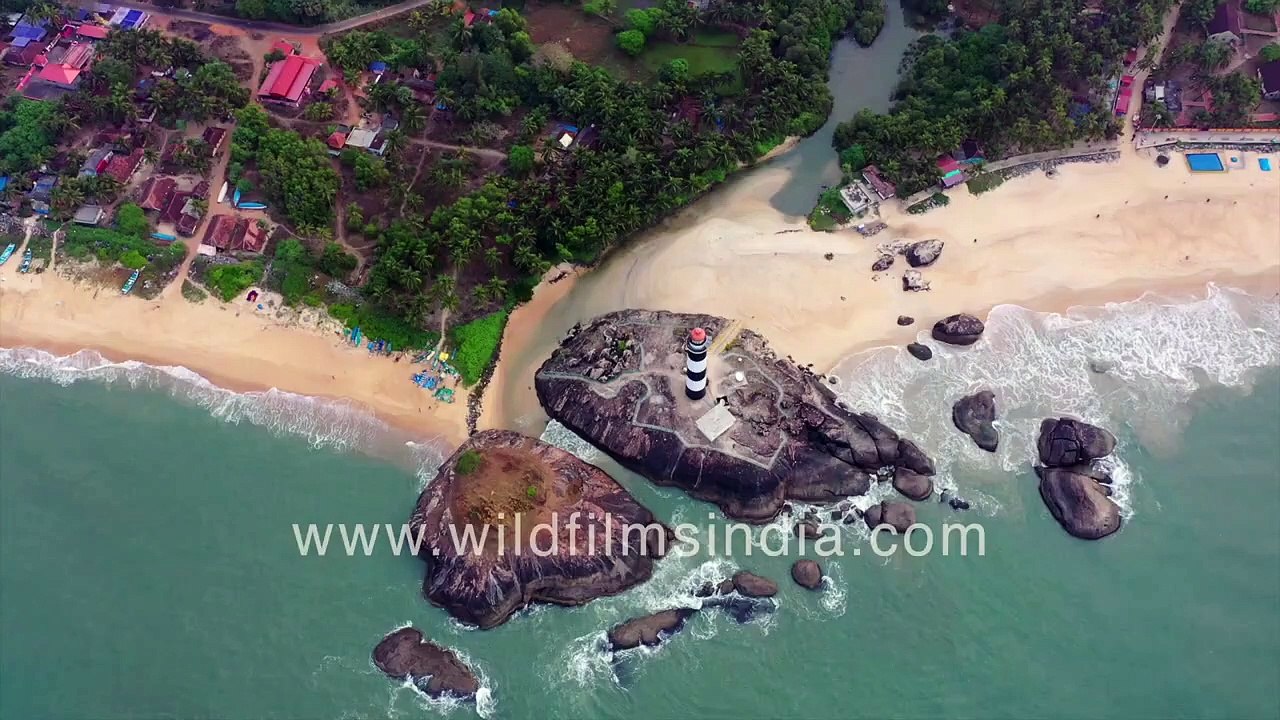 Kaup Lighthouse on huge rock on Arabian Sea sho...