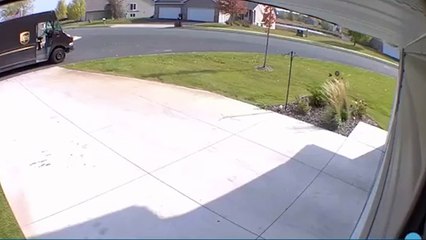UPS Man Rides in on Razor Scooter