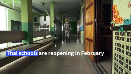 Soldiers clean schools in Bangkok ahead of reopening