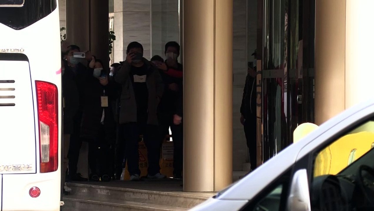 WHO experts leave Wuhan quarantine to start virus probe