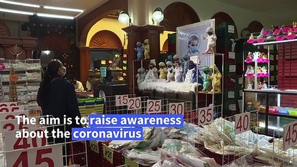 Baby Jesus dolls help raise Covid awareness in Mexico