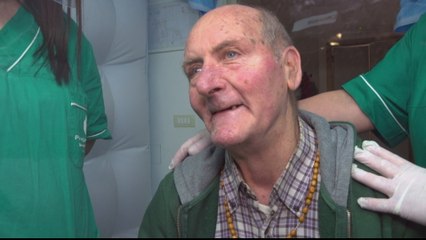 Italy's 'hug bubble': Care home finds safe way to restore affection