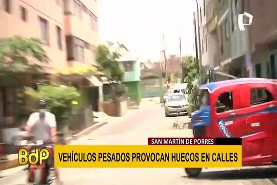 SMP: camiones de carga pesada causan grandes huecos en angosta calle