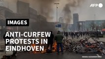 Anti-curfew protesters clash with police in Eindhoven _ AFP