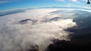 Flying over the mountains and the cloud