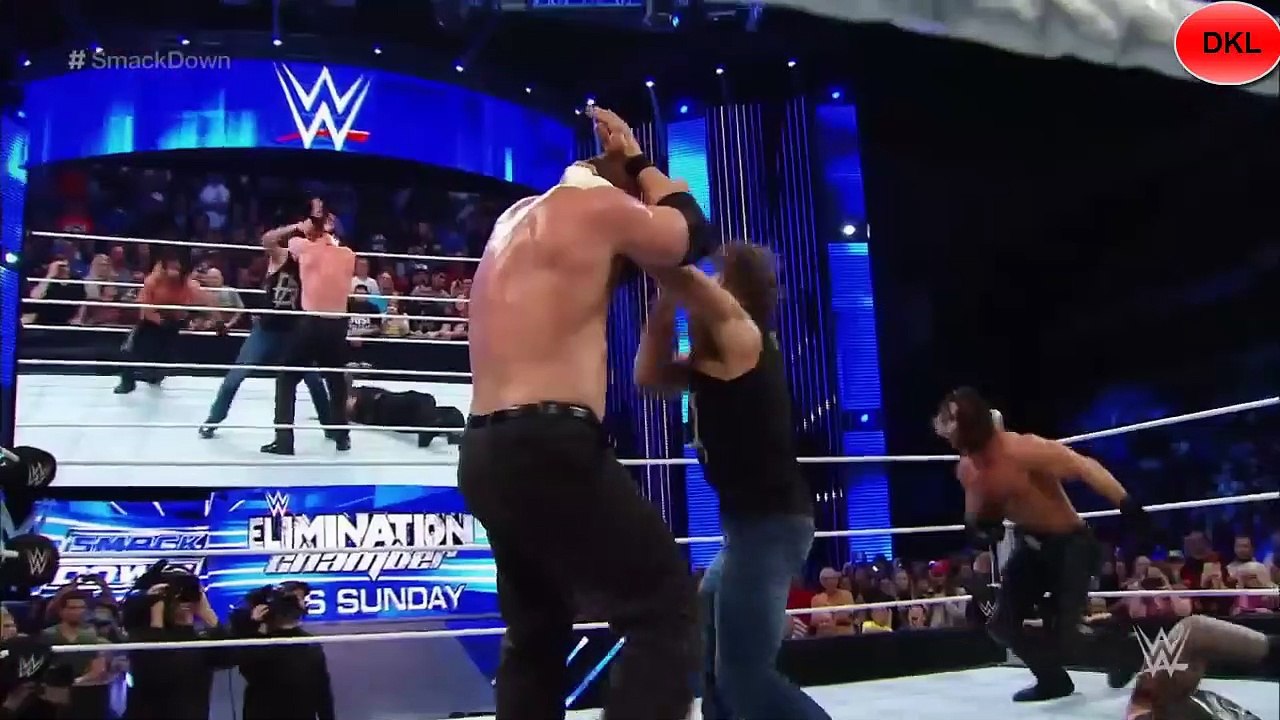 Kane and Rollins attack Roman Reigns and Ambrose