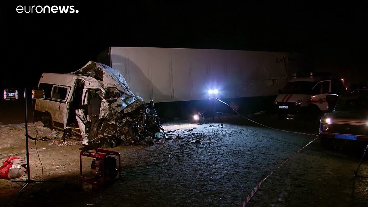 At least a dozen die after a tractor collides with a bus in central Russia