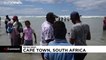 Акция протеста на пляже в Кейптауне