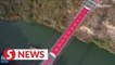 168m-long New Year scroll on world's longest glass-bottomed bridge