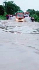 truck driving in flood water
