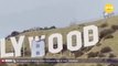 Six arrested for altering iconic Hollywood sign to read 'Hollyboob'