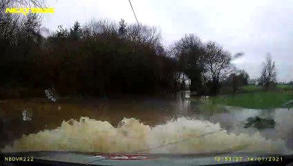 Dad Discovers Flooded Road is Deeper Than it Seems