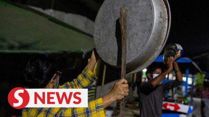 Cars horns, striking pans heard around Myanmar city to protest coup