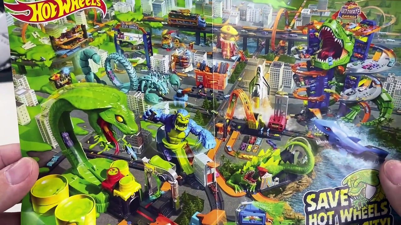 Chris plays with Hot Wheels cars and builds Hot Wheels City 