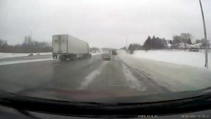 Car Spins out on Slick Roads and Dodges all Traffic