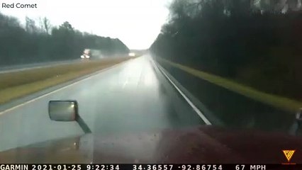 Car spins out going to fast in the rain