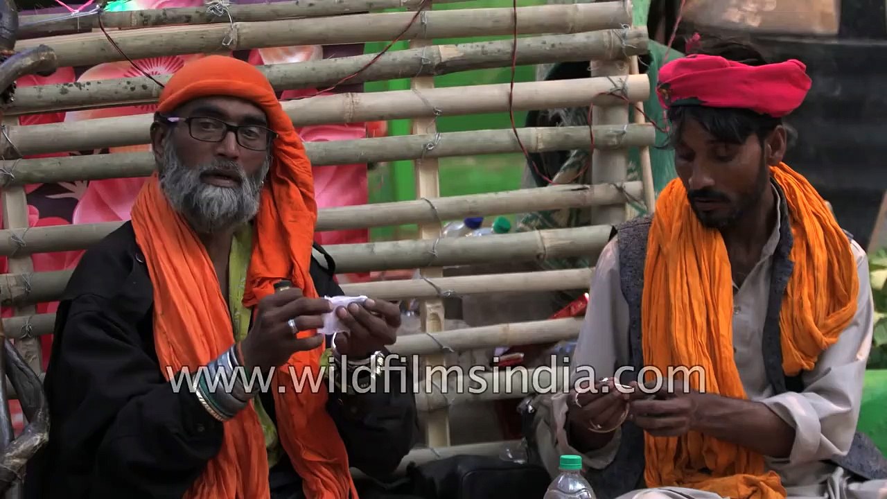 Sufi qalandar gets high as he smokes chillum in Ajmer, Rajasthan