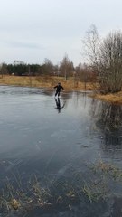 Man Ice Skating Finds Slim Spot in the Ice