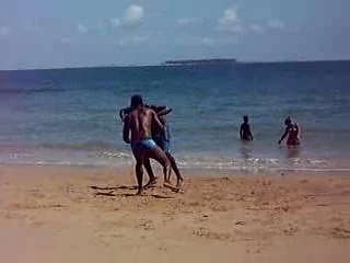 Capoeira masters practicing on a Brazilian beach Feb 08