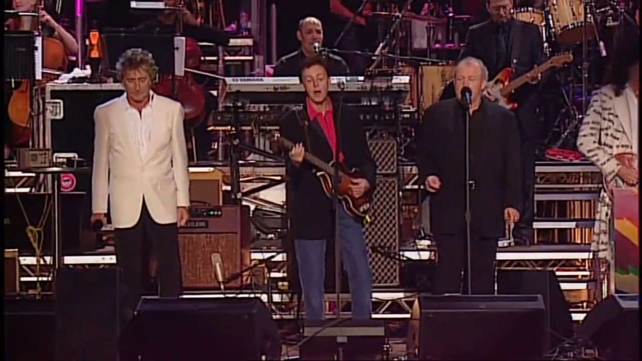 PAUL McCARTNEY, JOE COCKER, ERIC CLAPTON & ROD STEWART – All You Need Is Love
