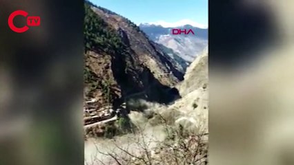 O anlar kamerada: Hindistan'da nehre düşen buzul sele neden oldu