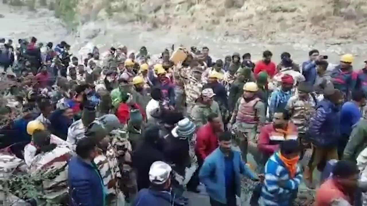 Trapped men rescued in India river torrent disaster