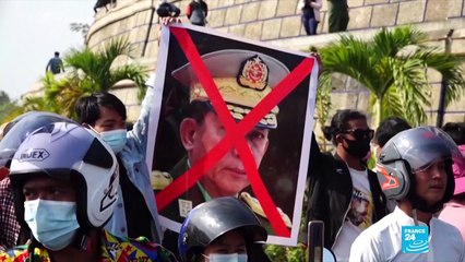Myanmar general repeats pledge of new election as thousands join protests against coup