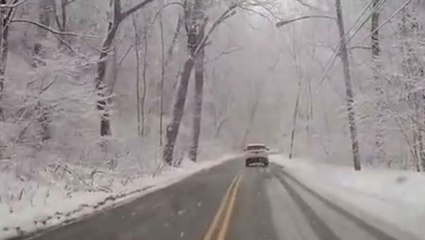 Scenic drive on snowy road in Pennsylvania