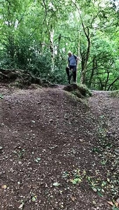 Mountain Unicyclist Attempts Difficult Trail Stunt