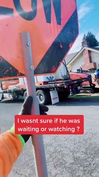 Pedestrian Patiently Waits for Slow Sign