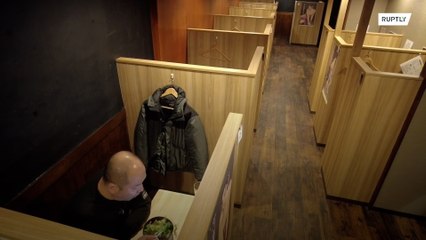 Japanese bar offers lone drinking solution amid COVID spread