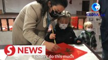 German family writes couplets ahead of Chinese New Year