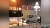 Aracının üzerine kardan adam yapıp sokak sokak gezdi