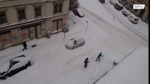 Leipzig residents ski through streets as snow blankets city