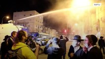 Police use water cannons to disperse ultra-Orthodox protesters defying COVID measures