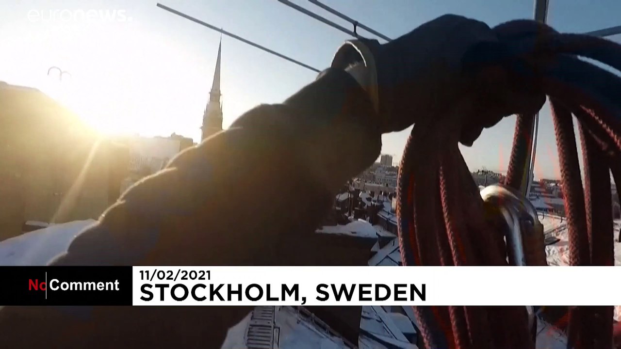 Stockholm roofers brave dizzying heights to swe...