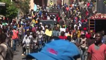 Haiti protesters clash with police as they demand President Jovenel Moise's resignation
