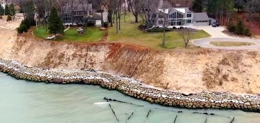 Powerful Water of Lake Michigan Erodes Riverfront Land and Breaks Houses on it