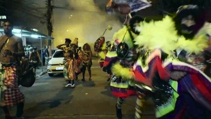 Rio carnival cancelled but revellers in suburbs still celebrate