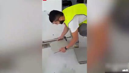 Türk işçinin ders niteliğindeki fayans döşemesi kamerada