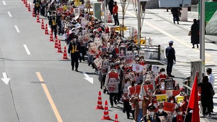 Thousands march in Tokyo against Myanmar coup; Navalny supporters hold flashlight protests on V-Day; more