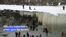 Frozen waterfall draws crowds in Estonia