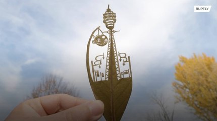 Japanese artist hand carves intricate scenes into leaves