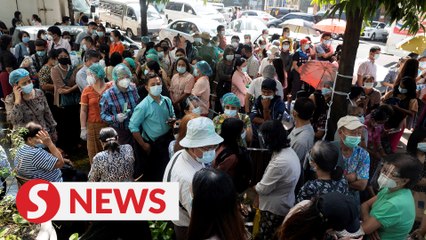 Myanmar people withdraw money from military-owned bank following coup