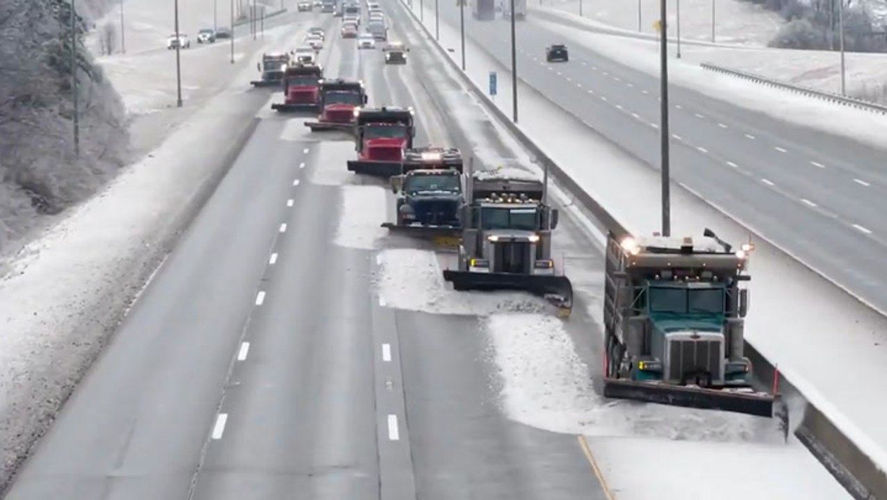 Team of snowplows clears out Kentucky interstate