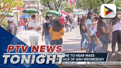 Devotee makes time to hear mass for today's observance of Ash Wednesday