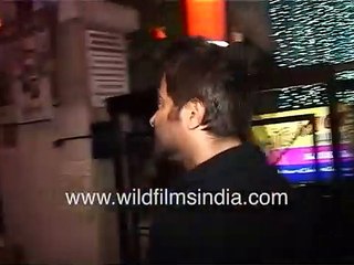 Anil Kapoor jokes with photographers after arriving at 'Chocolate' film success party