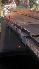 Man in Wheelchair Hangs on While Drawbridge Moves