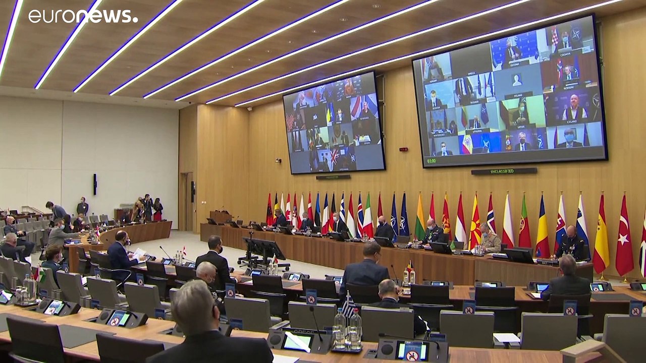 NATO to increase training in Iraq but delays decision on Afghanistan